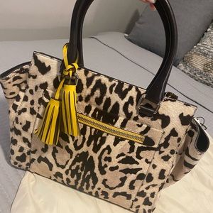 NWT Coach Legacy Ocelot Haircalf Carryall Bag 21165
Retail: $1400